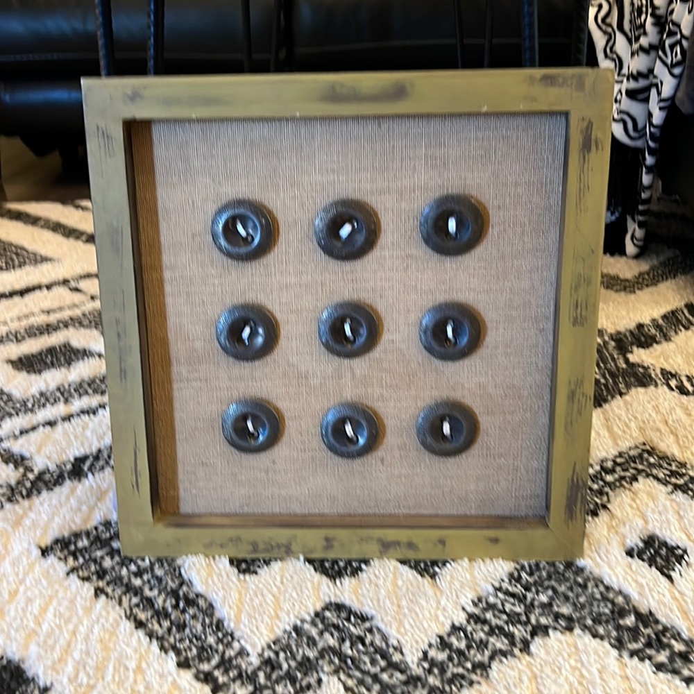 Industrial Artwork featuring large buttons.